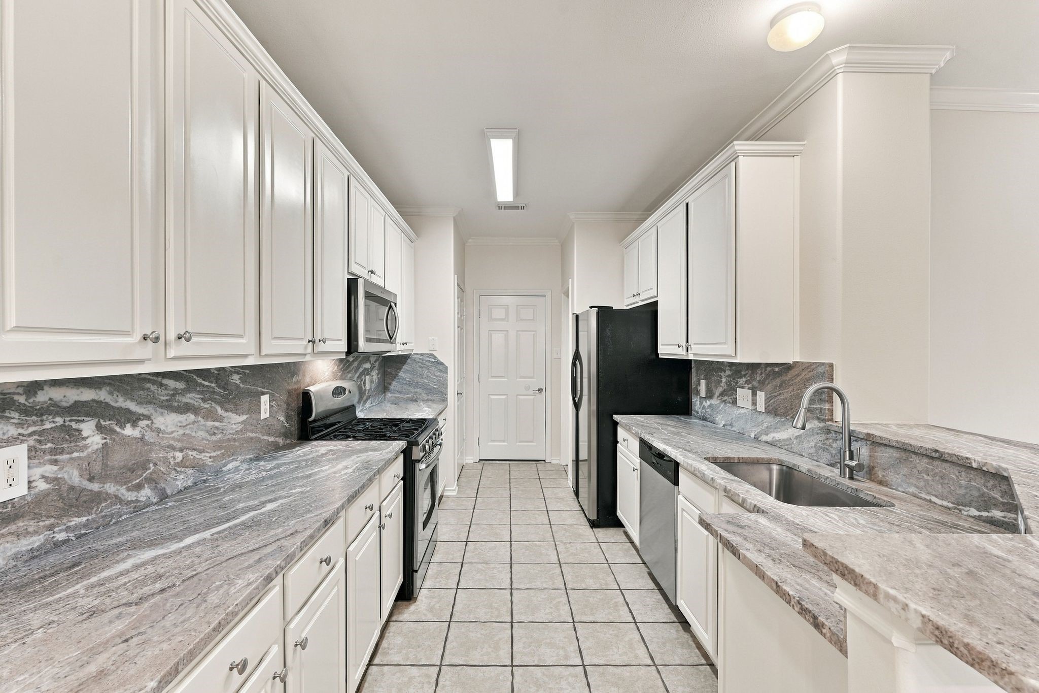 Be the first to enjoy these newly installed luxury granite counters, microwave, dishwasher and sink.   The cabinets have just been painted, and there are two large pantries that offer a significant amount of storage.