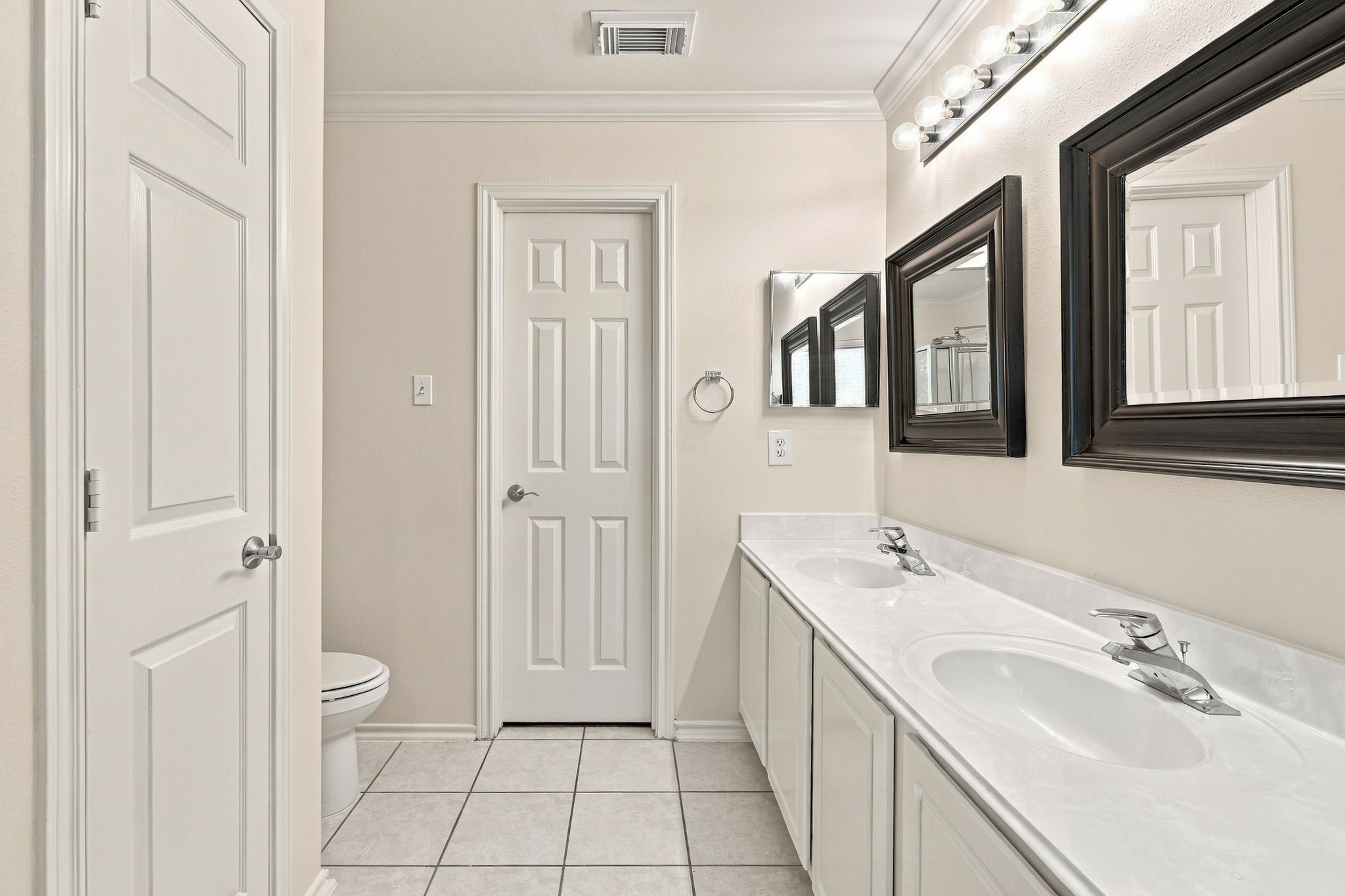 The linen closet offers additional storage.