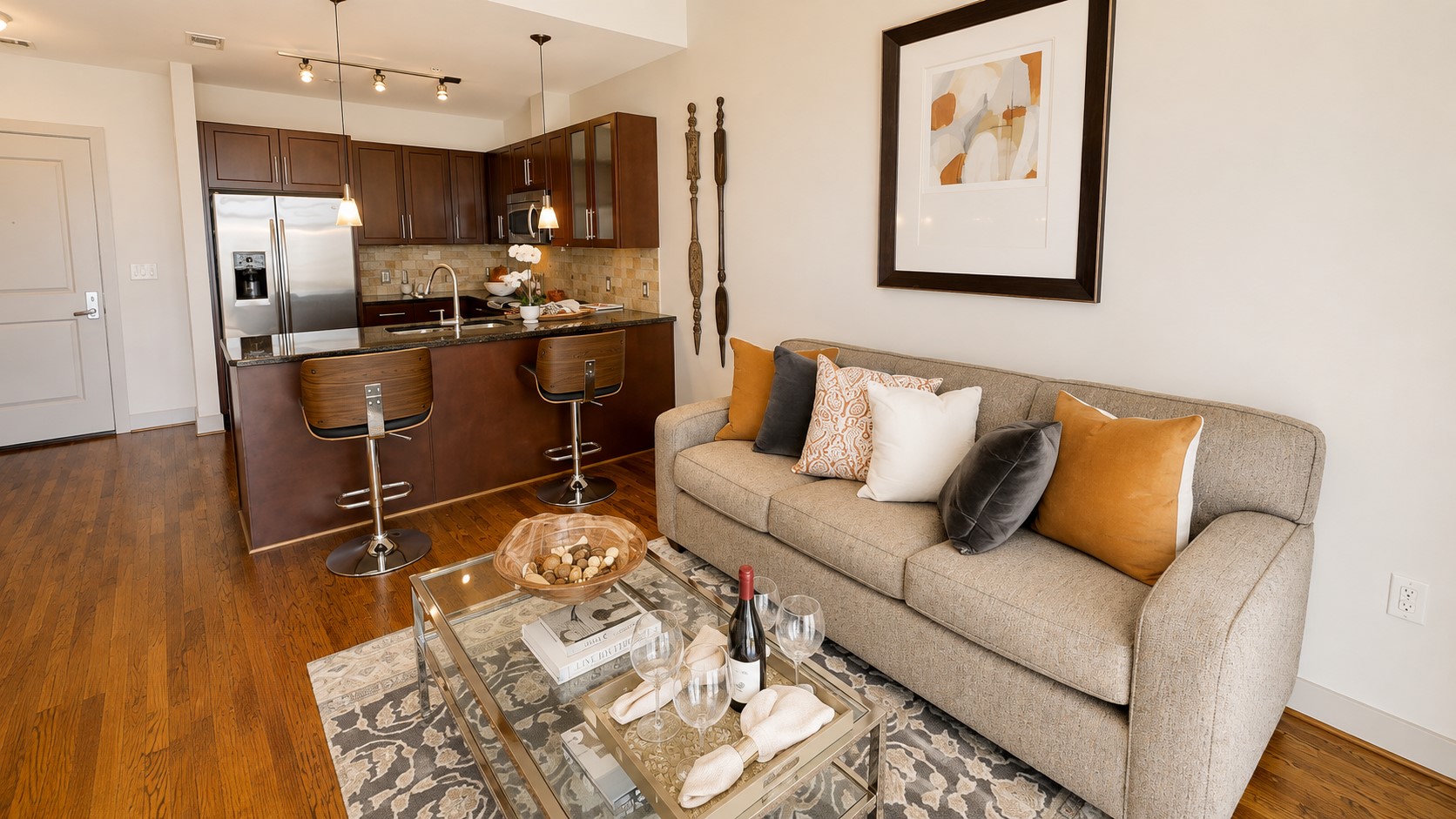 Comfortable enough for a quiet evening at home and open enough for friends to gather, this living room easily adapts to both. Comfortable enough for a quiet evening at home and open enough for friends to gather, this living room easily adapts to both.