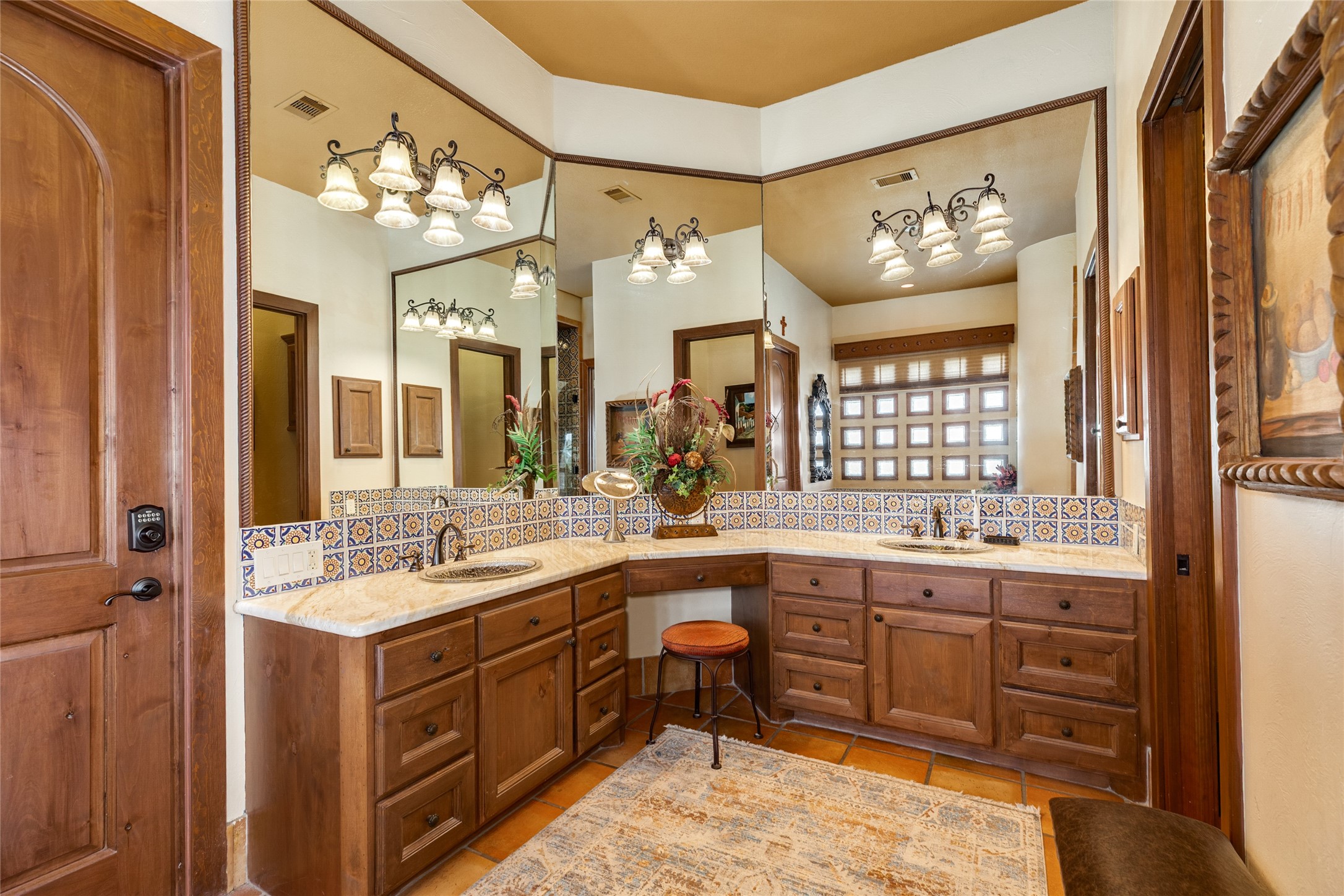 Primary bathroom with double sinks, large walkin closet