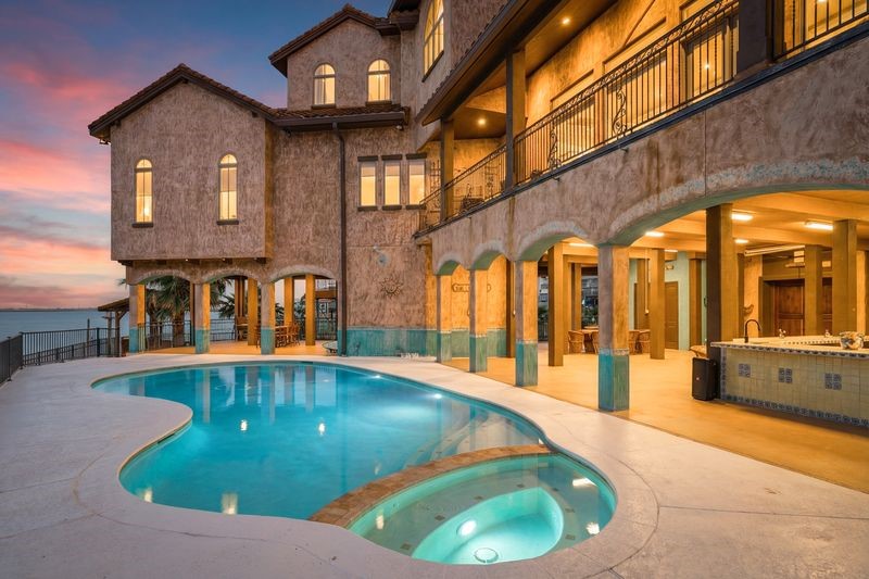 Pool with large ground level entertainment space