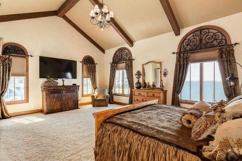 Primary bedroom with views of water, 1st level