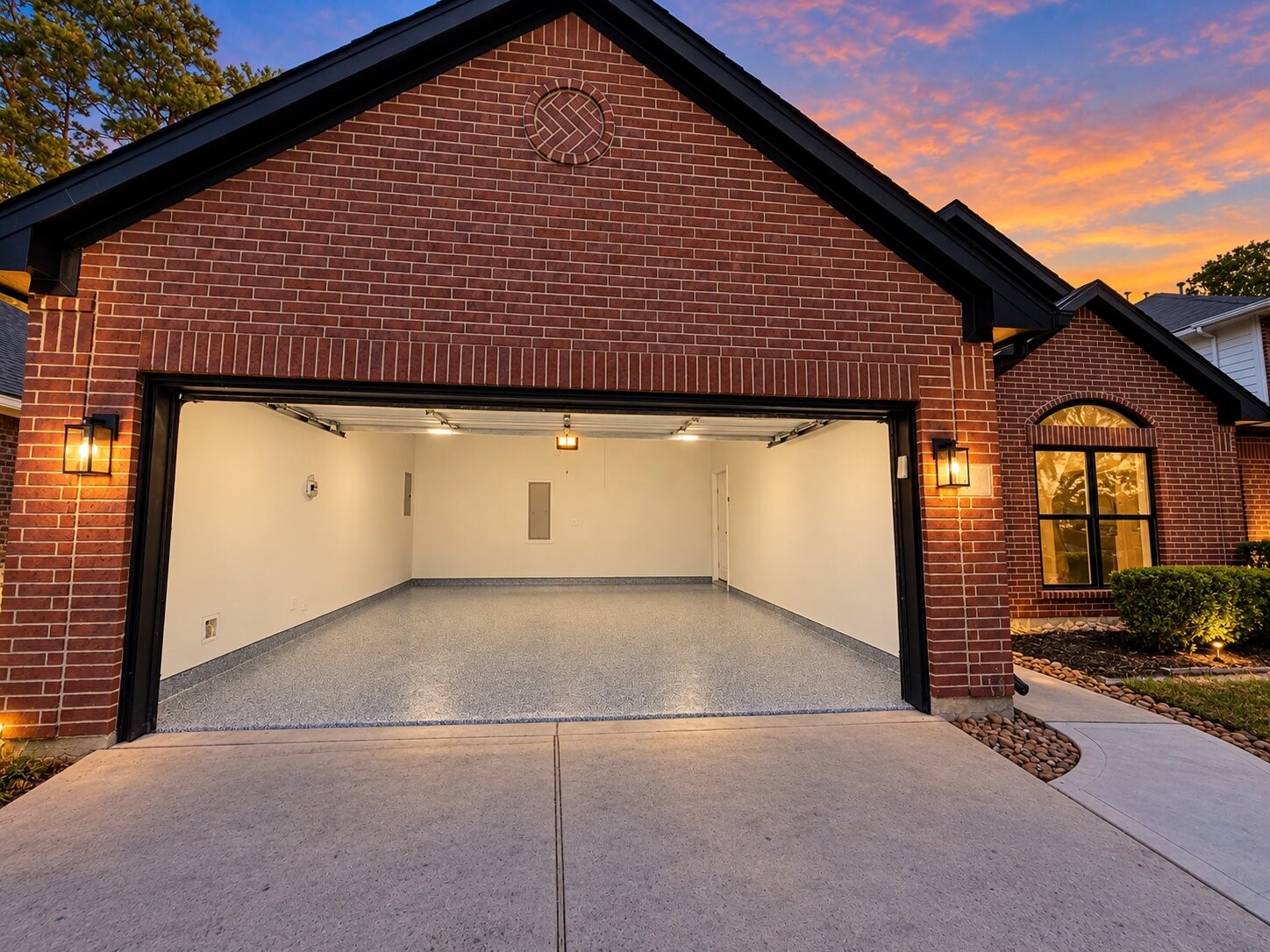 The two-car garage at 18 Griffin Hill Court just received a professionally installed epoxy floor coating this week  a fresh, high-gloss upgrade that adds both visual appeal and long-term durability to this functional space. With the garage door open, the sleek, polished finish is on full display. A standout feature that reflects the quality of care put into every corner of this home.