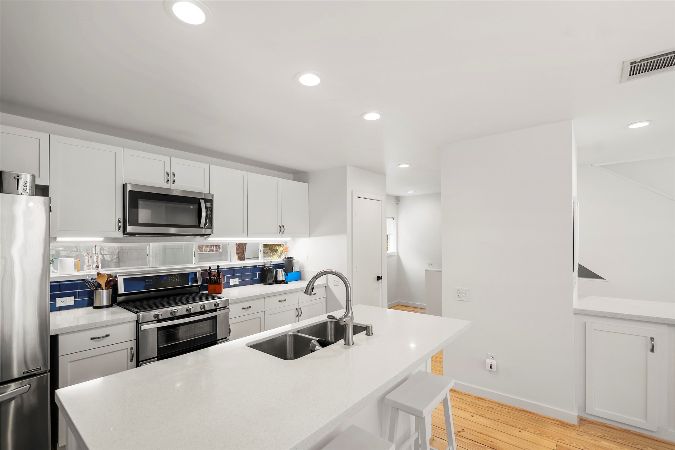 Kitchen with many updates and views of the yard
