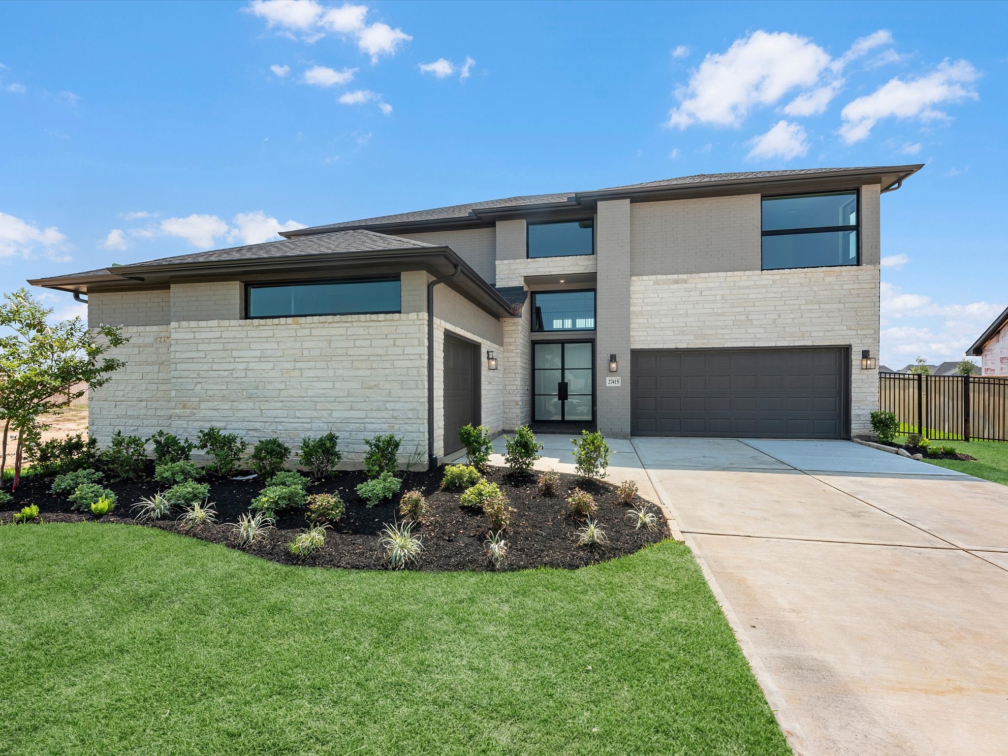 Move-In Ready! Westin Homes | Dawson  New Construction. Grass is digitally enhanced.