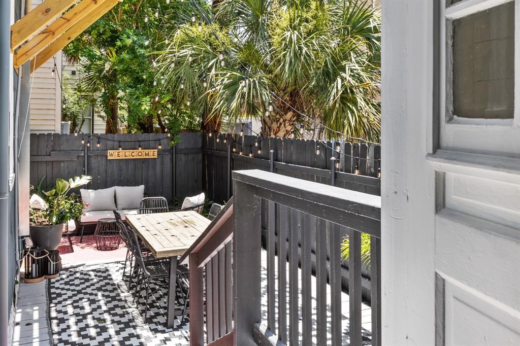 Backyard deck offers seating space.