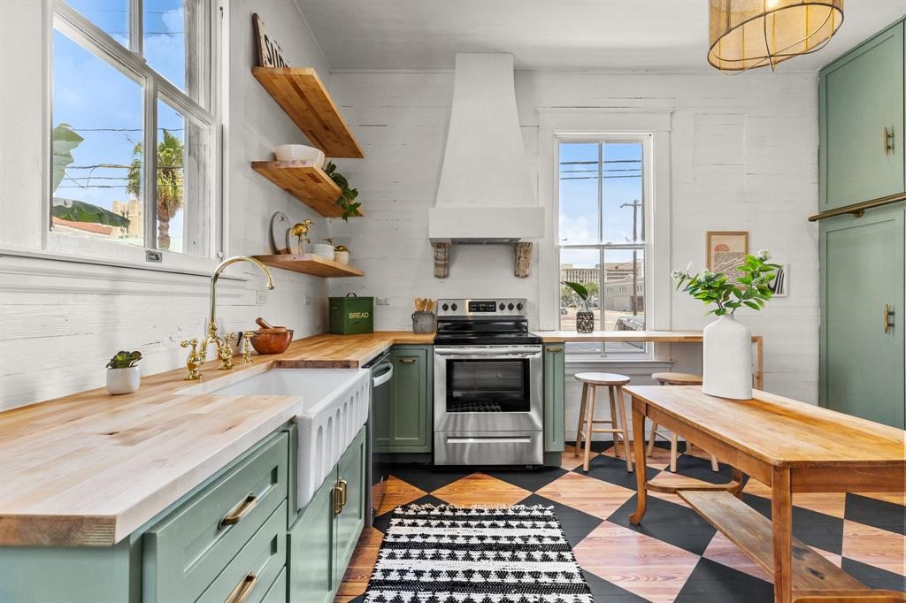 Butchers block countertops, apron sink, outdoor access