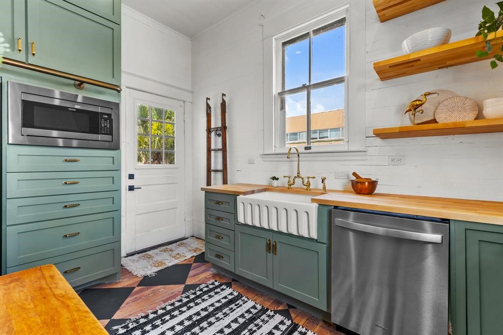 Butchers block countertops, apron sink, outdoor access