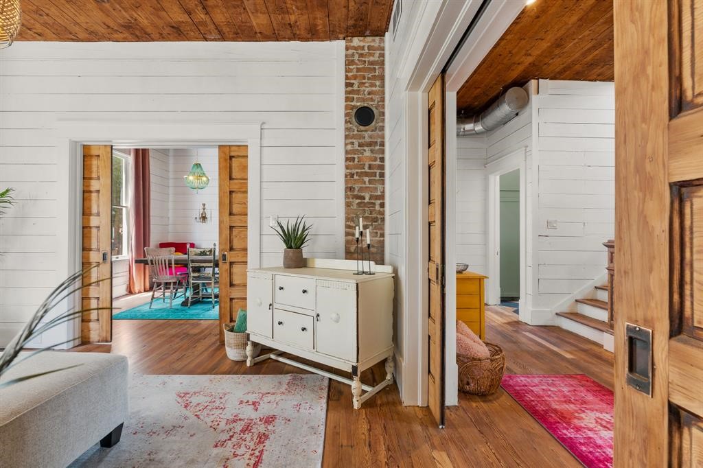 Pocket doors on either side of the living room offering the option of privacy or open concept.