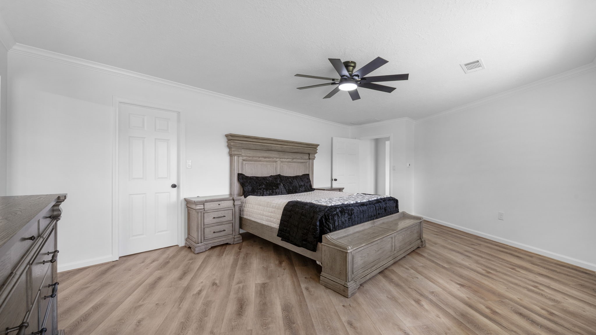 Primary bedroom with large walk in closet, plenty of room for big furniture