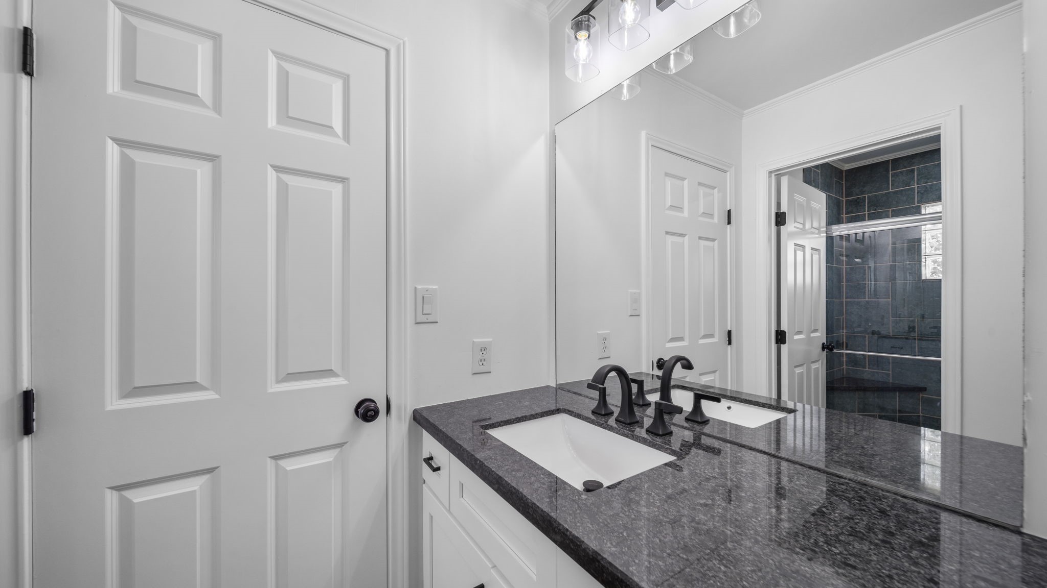Bathroom #2 separate shower area includes linen closet