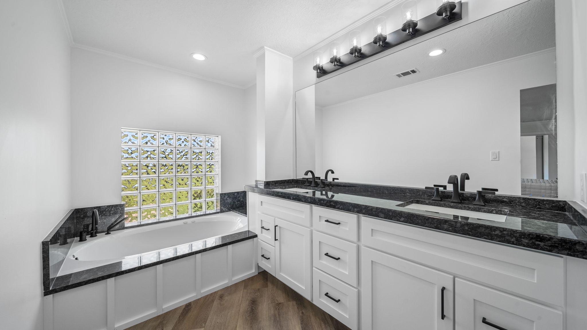 Large Primary jetted tub, double sinks all new cabinets, granite, fixtures, lights