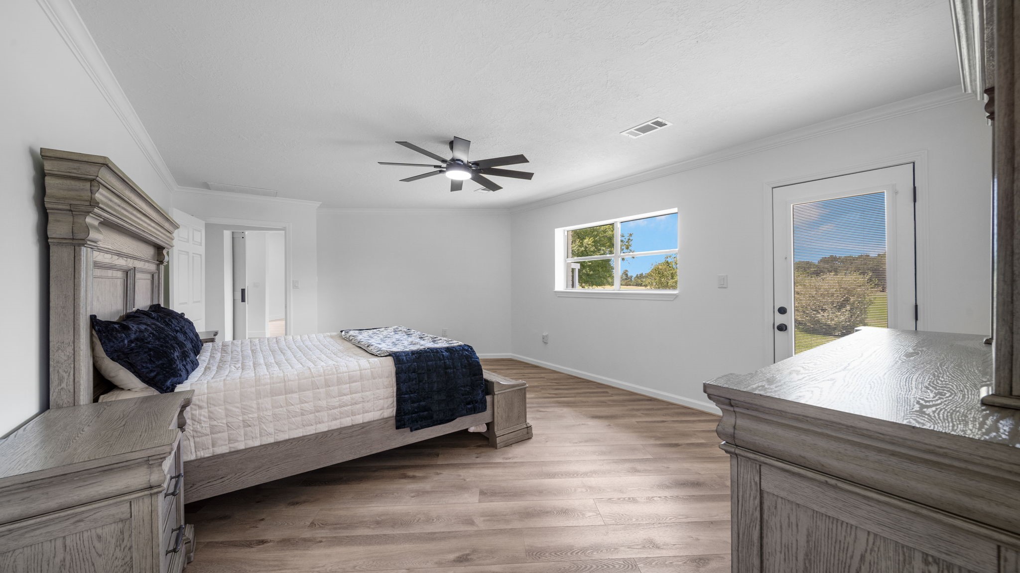 Large Primary bedroom, has exterior door leading to your deck, walk in closet