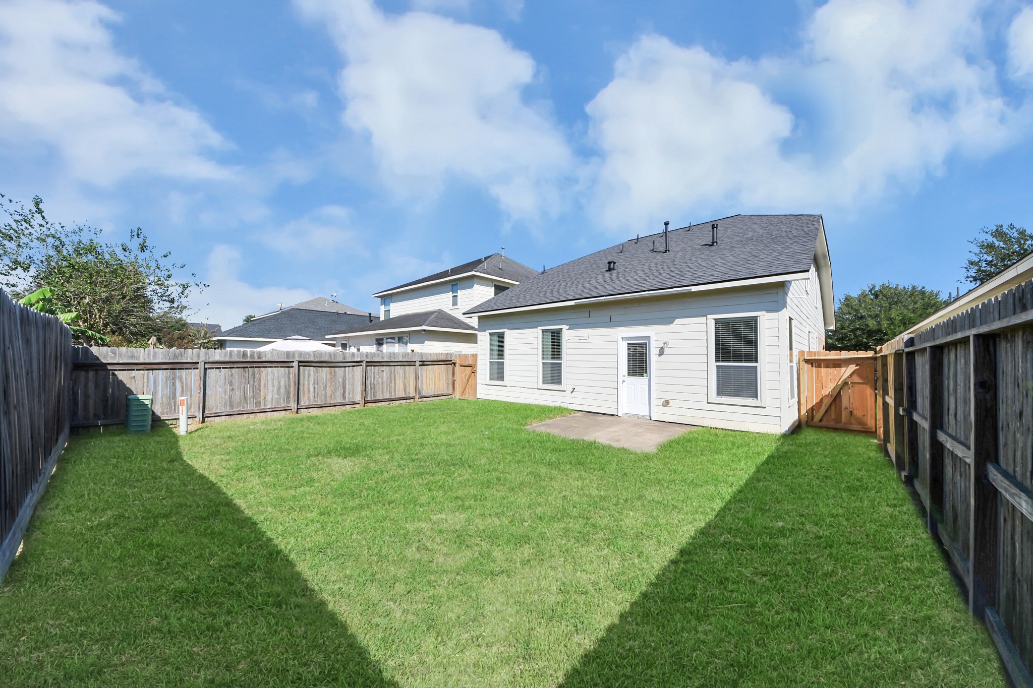 Plenty of Backyard space for hosting