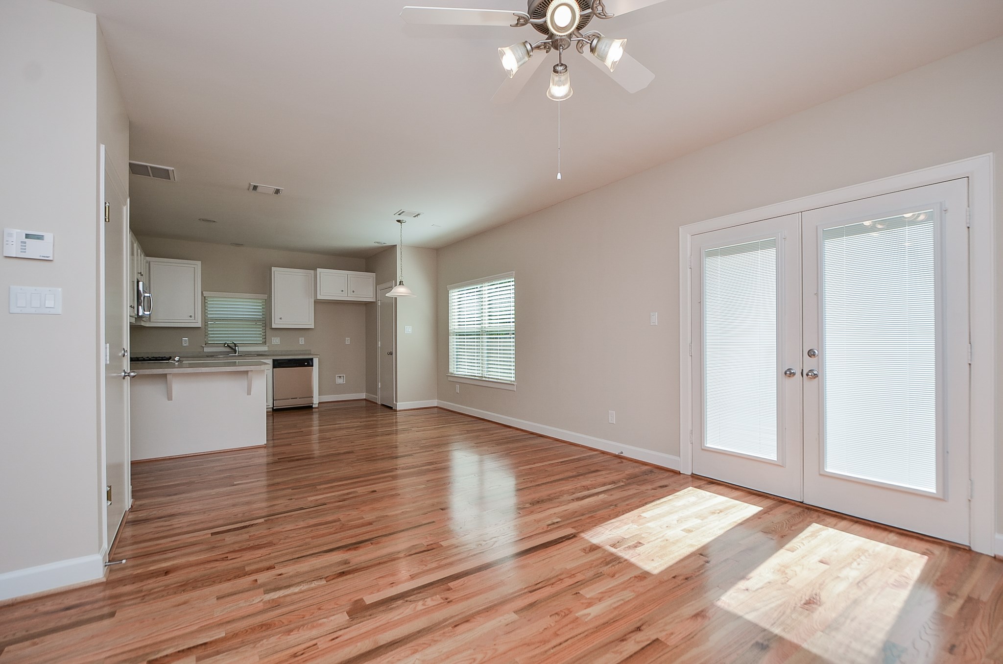 The first floor of the home provides an open floorplan with ample space for living and entertaining as well as an abundance of natural light.