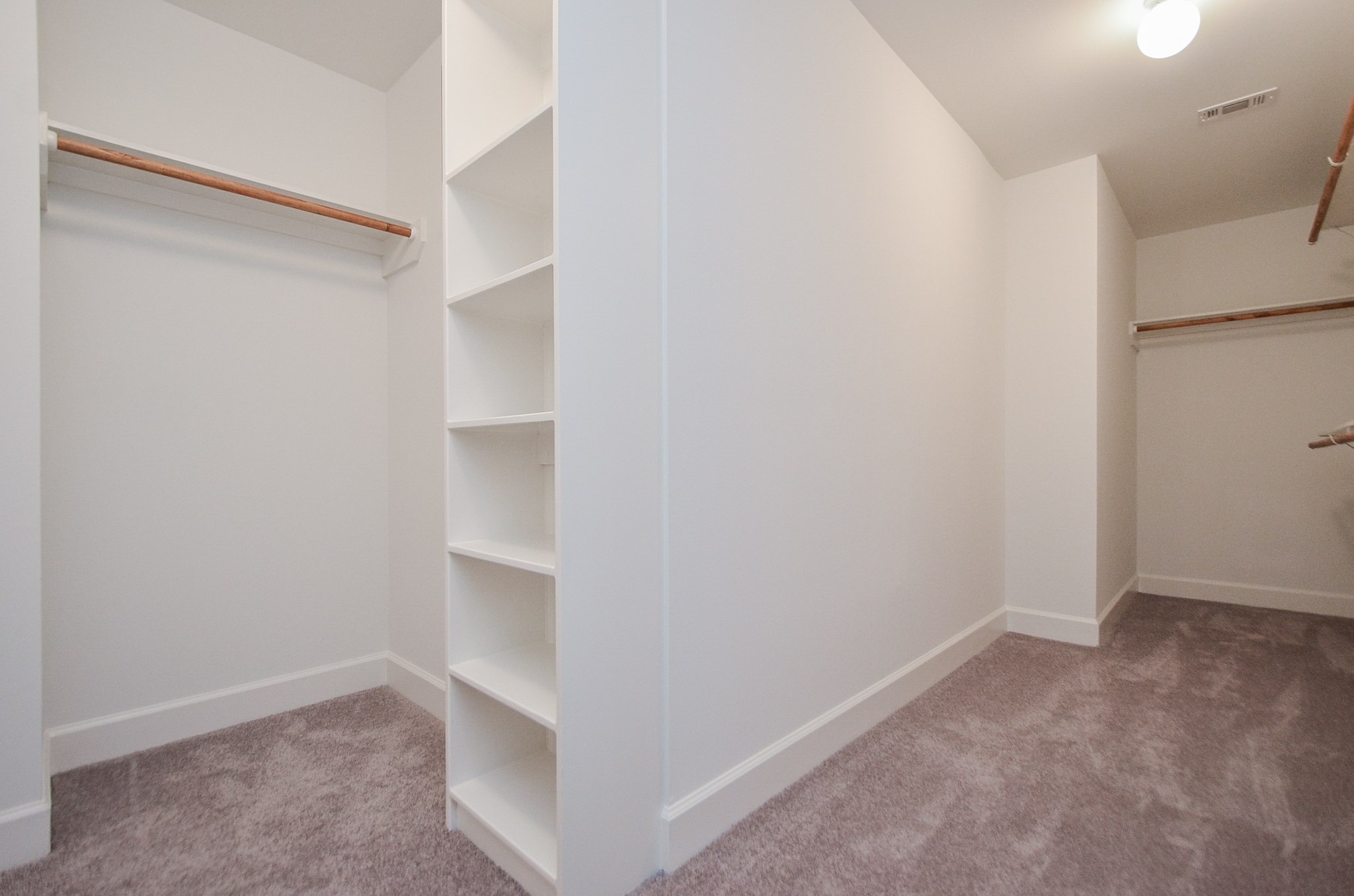 Check out all of the space and storage that the master closet provides!  Plenty of room for clothing, bags, shoes, and other necessary storage.
