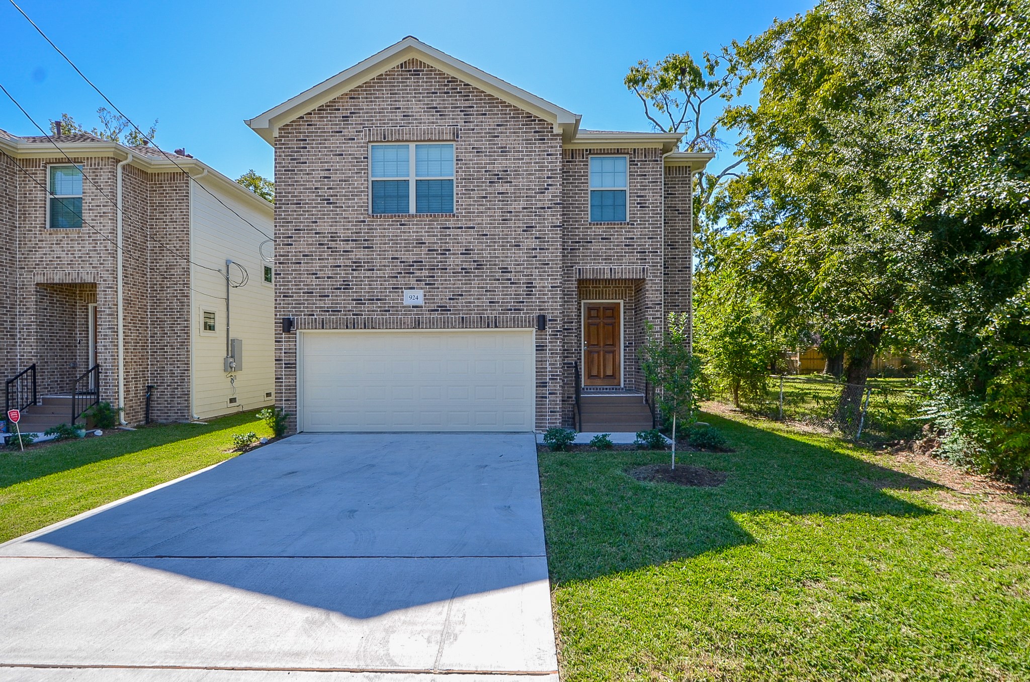 Beautiful brick exterior and mahogany wood door provide great curb appeal.