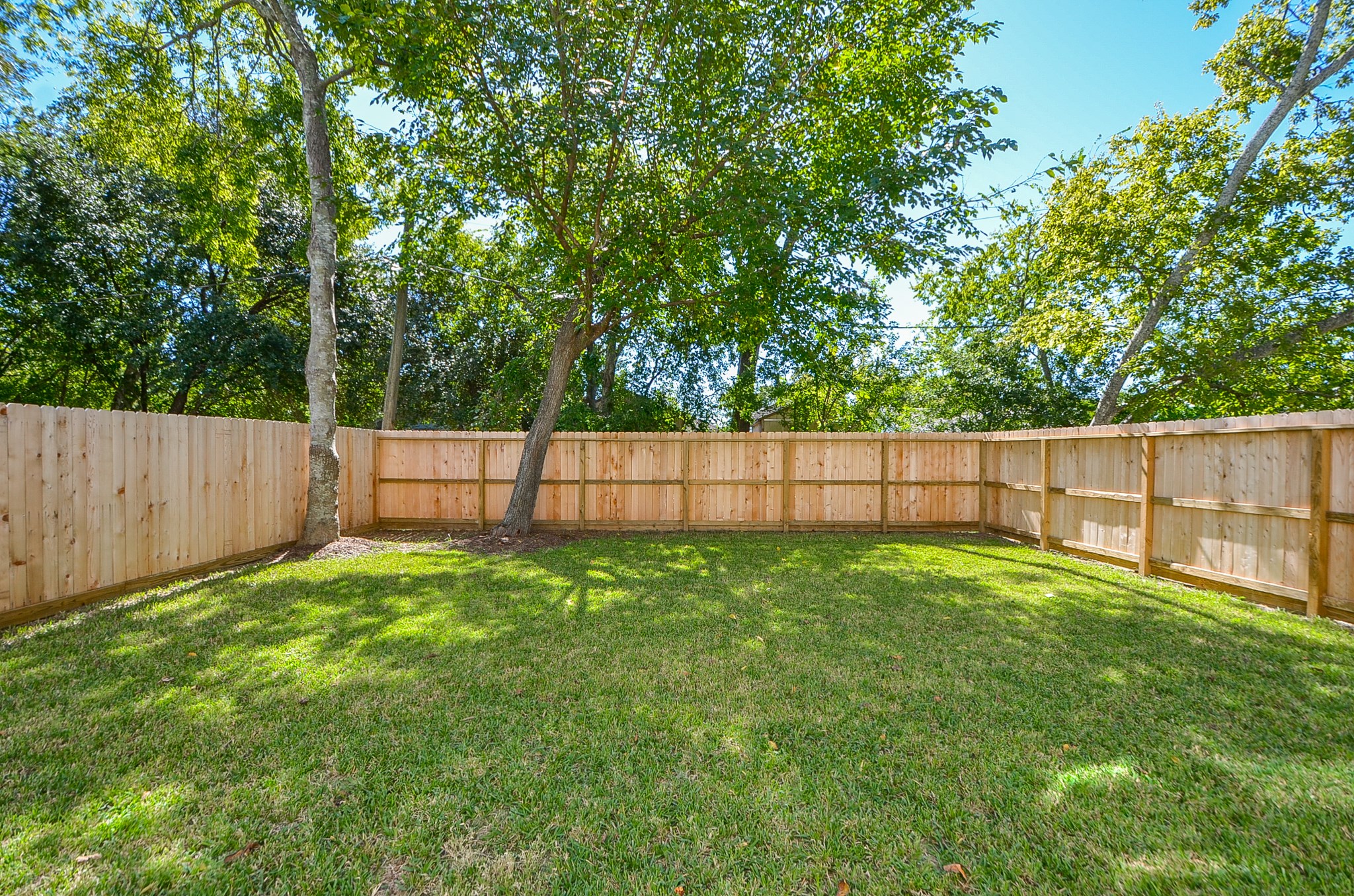 Maybe a hammock in between the trees?  The possibilities for this yard are endless.  Welcome home to 924 E. 39th St!