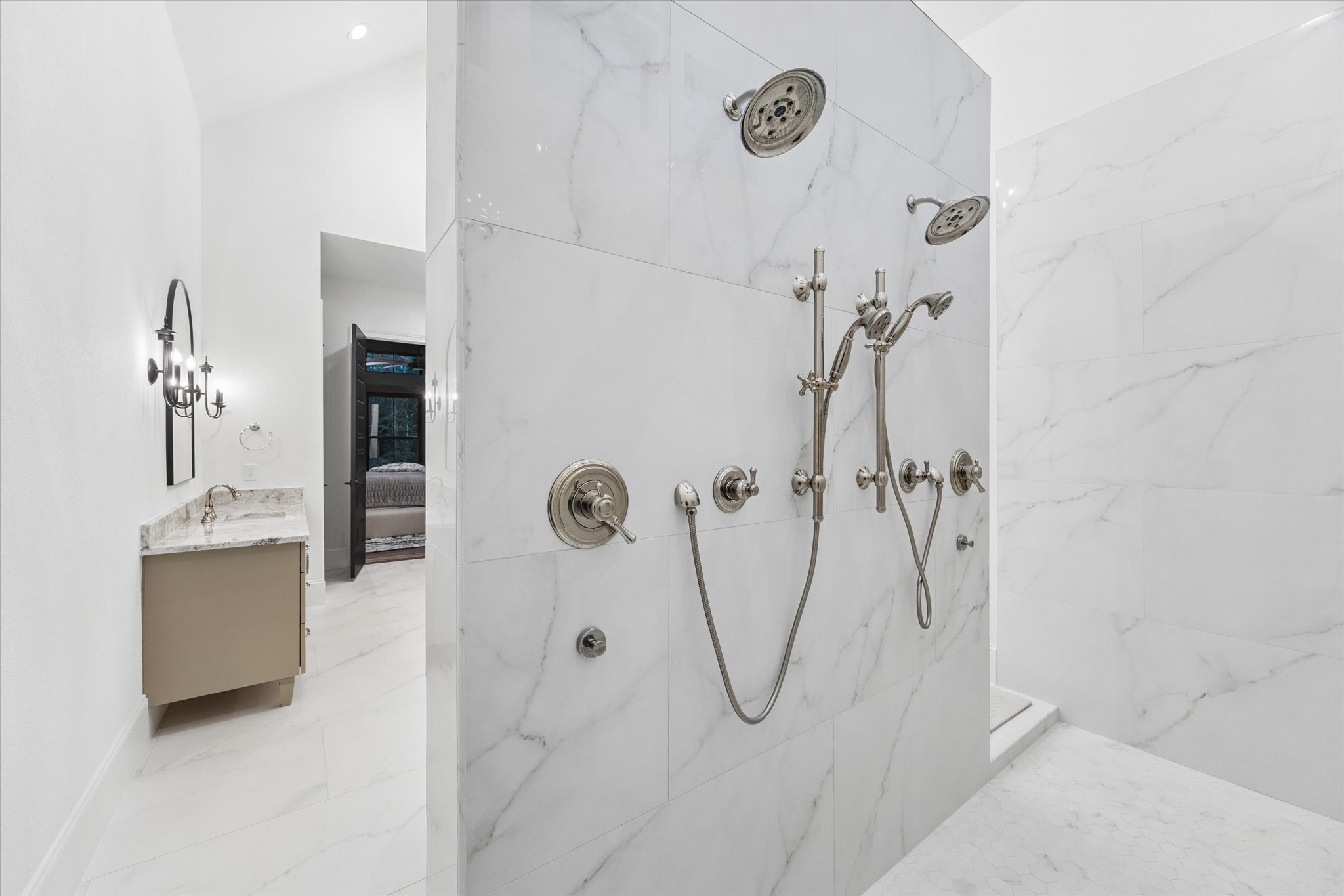 Designed to rejuvenate, the expansive walk-through shower features multiple body jets that create a true spa experience. Premium finishes and impeccable craftsmanship transform everyday routines into moments of relaxation.