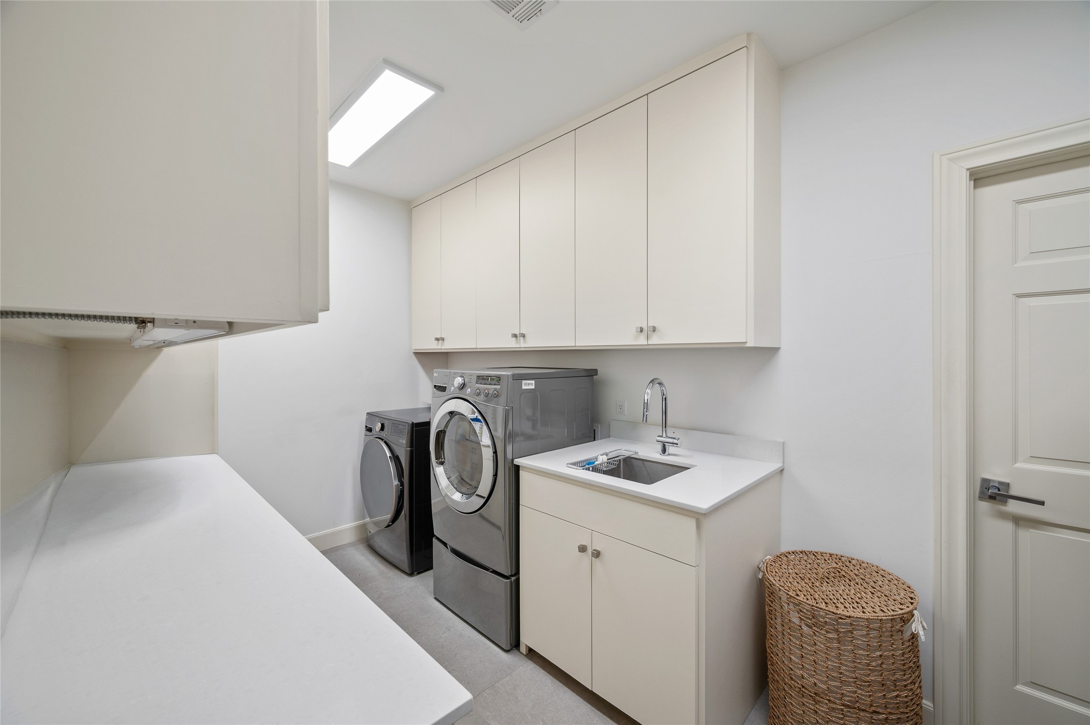 [Laundry / Utility Room]
Located on the second floor near the bedrooms and gameroom.