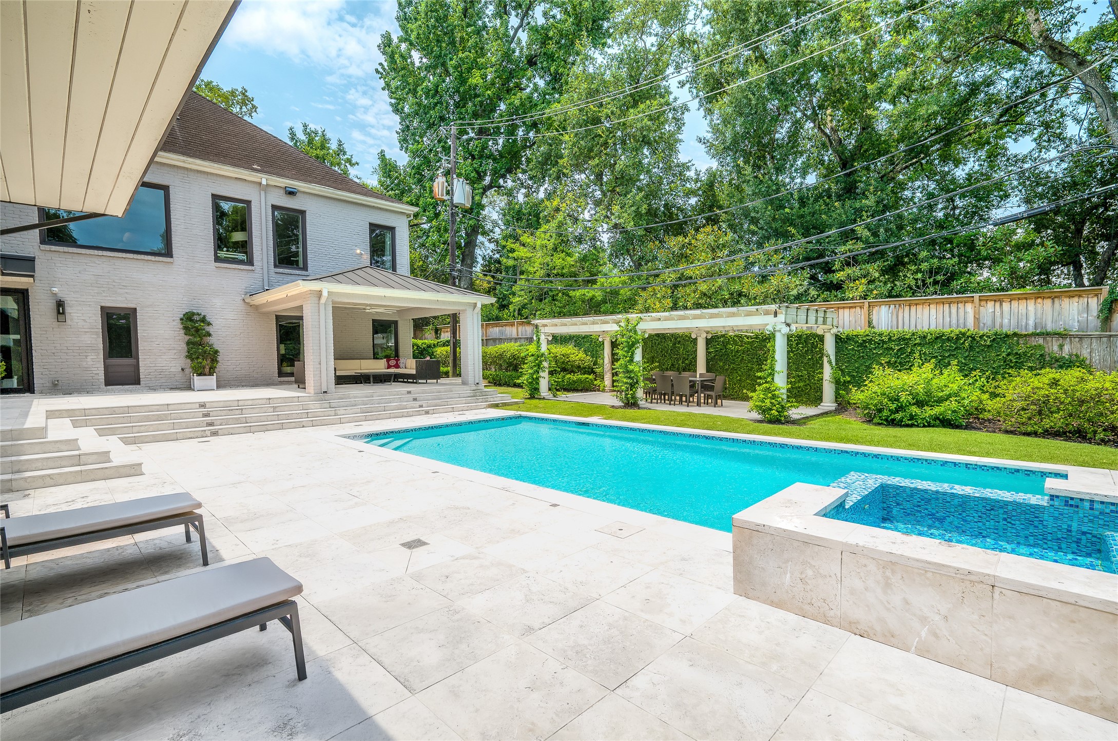 [Patios, Cabanas, Spa, and Pool]
Terraces surrounding the pool and spa offer open-air and covered patios, a cabana, and an adjoining lanai outdoor living or dining room.