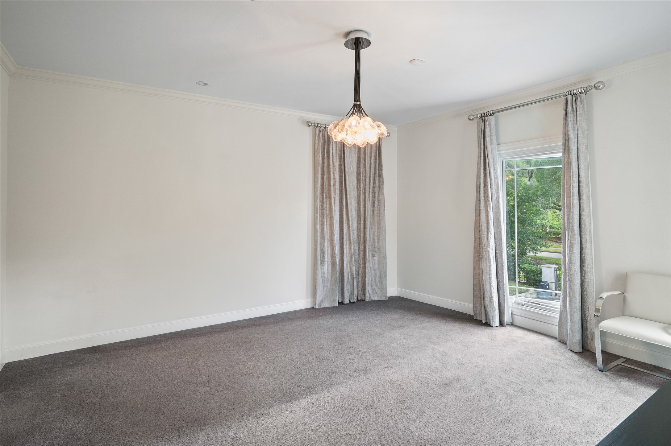 [En Suite Bedroom]
Amenities include a custom-fitted closet and en suite bath.