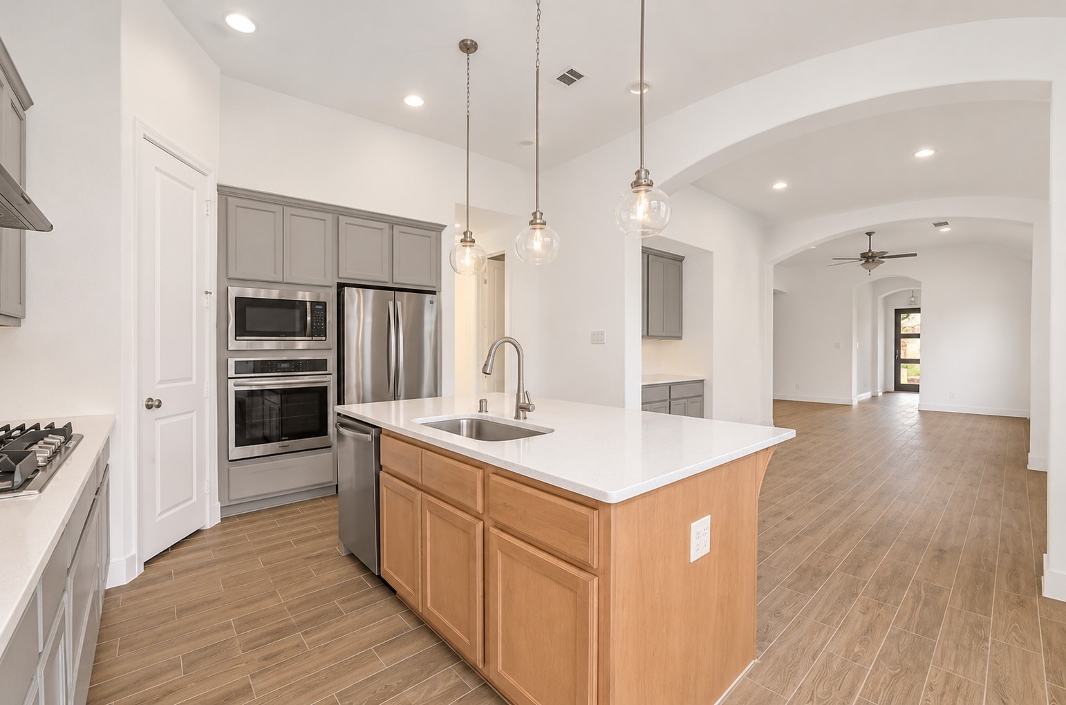 Gorgeous kitchen is open into the living and dining areas.