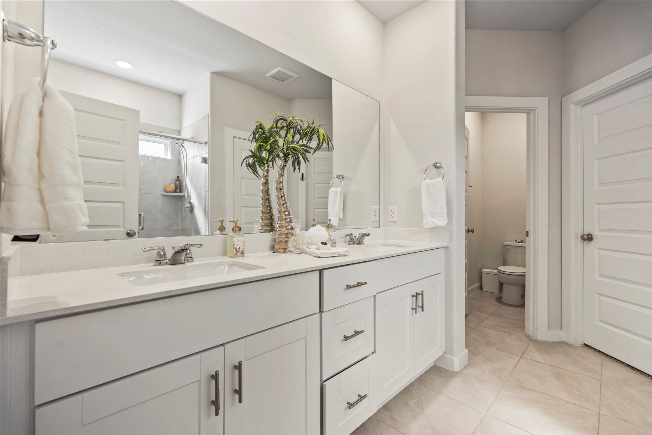 Large master bathroom with double sinks.