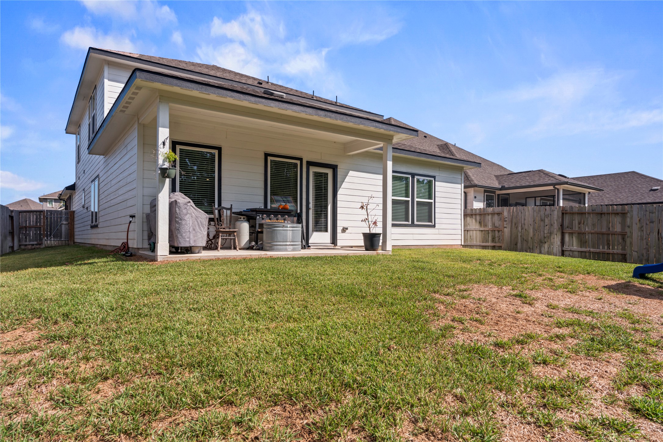 Large yard, covered patio, and no back neighbors.