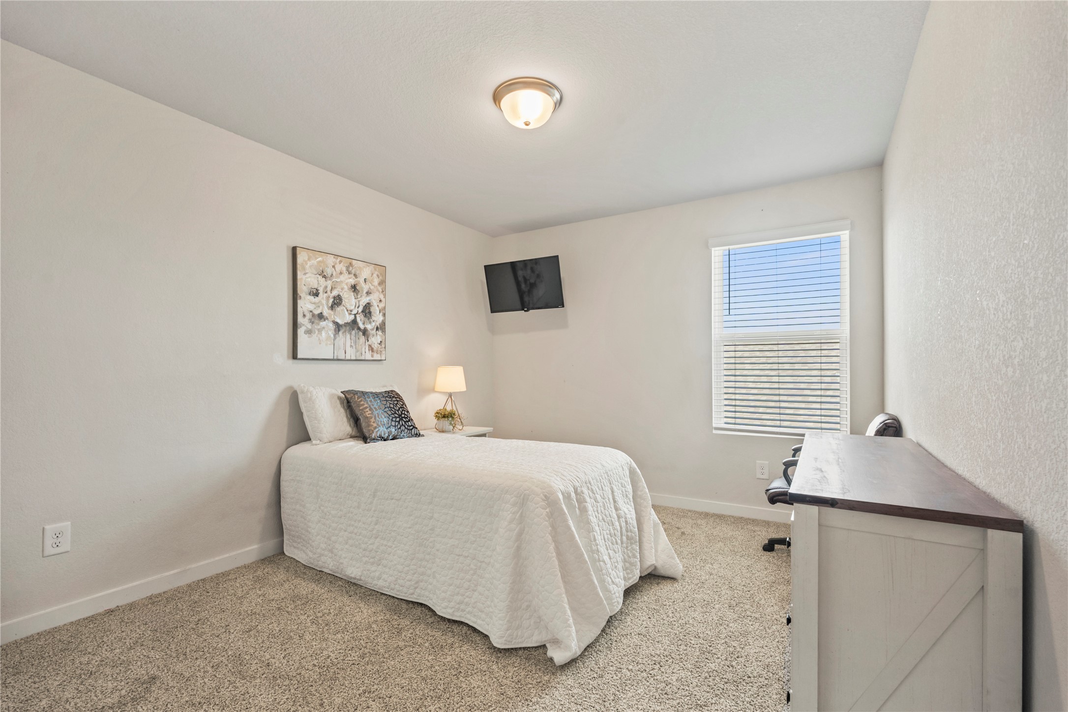 Fourth bedroom upstairs with lots of space.