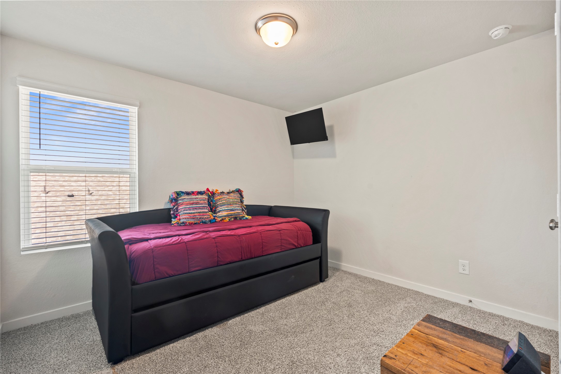 Fifth bedroom with space and plenty of light.