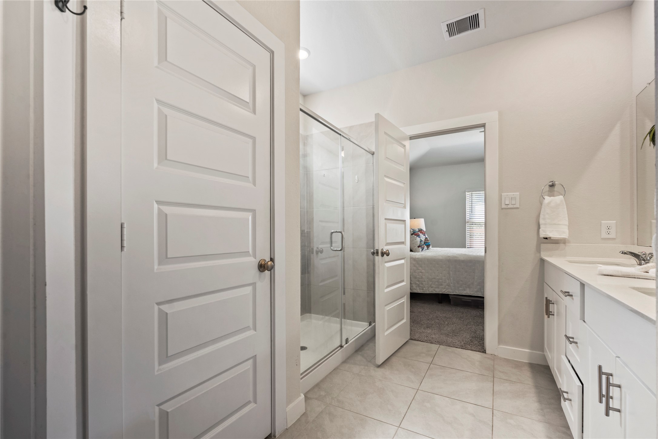 Large master bath with a walk in shower.