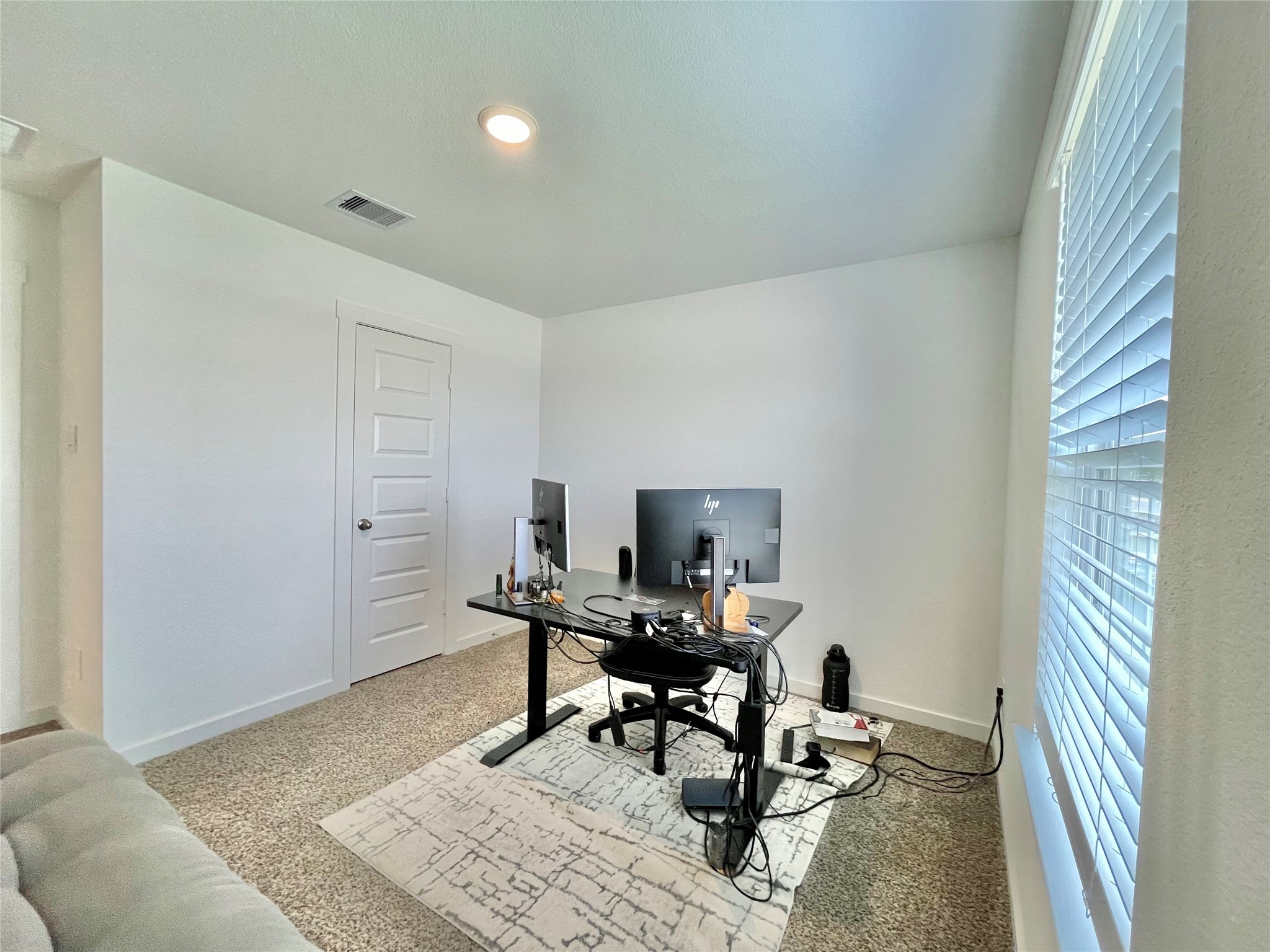 Focus and thrive in this private home office space, perfectly positioned away from the main noise for maximum productivity.