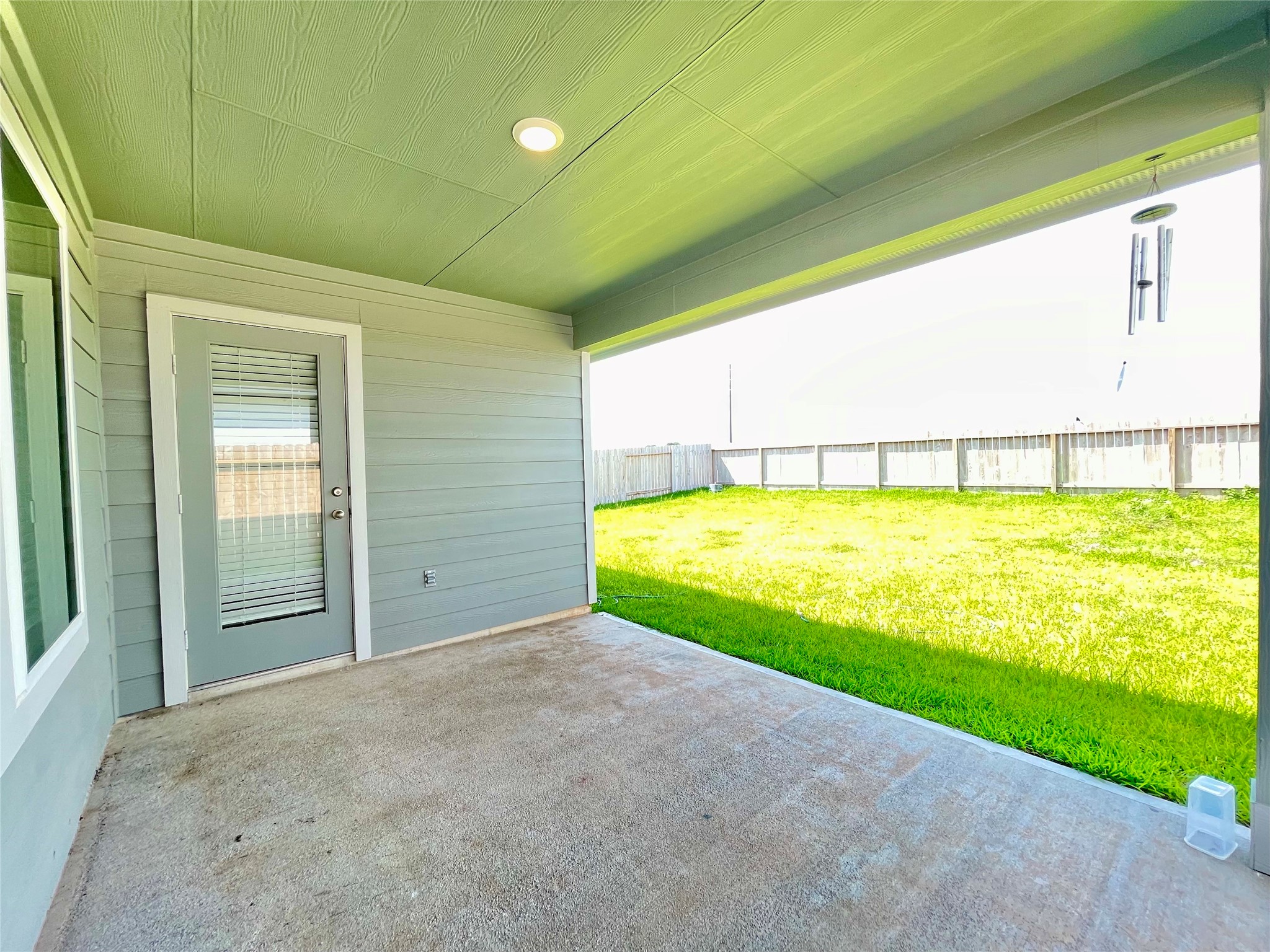 Step outside to an expansive, covered back patioyour new go-to spot for morning coffee or weekend BBQs.