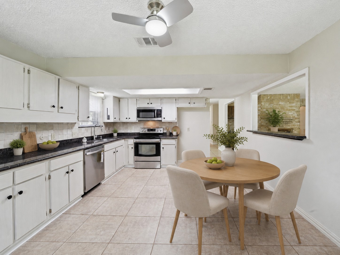 Kitchen. Photos have been virtually staged for marketing purposes. Furniture, decor, and other items shown may not be present in the home.