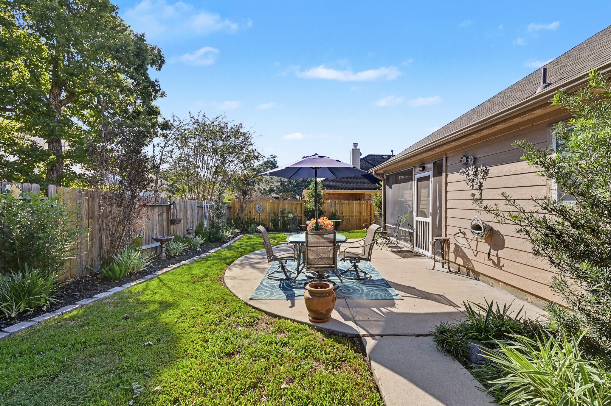 Extended patio for outdoor dining & relaxation.