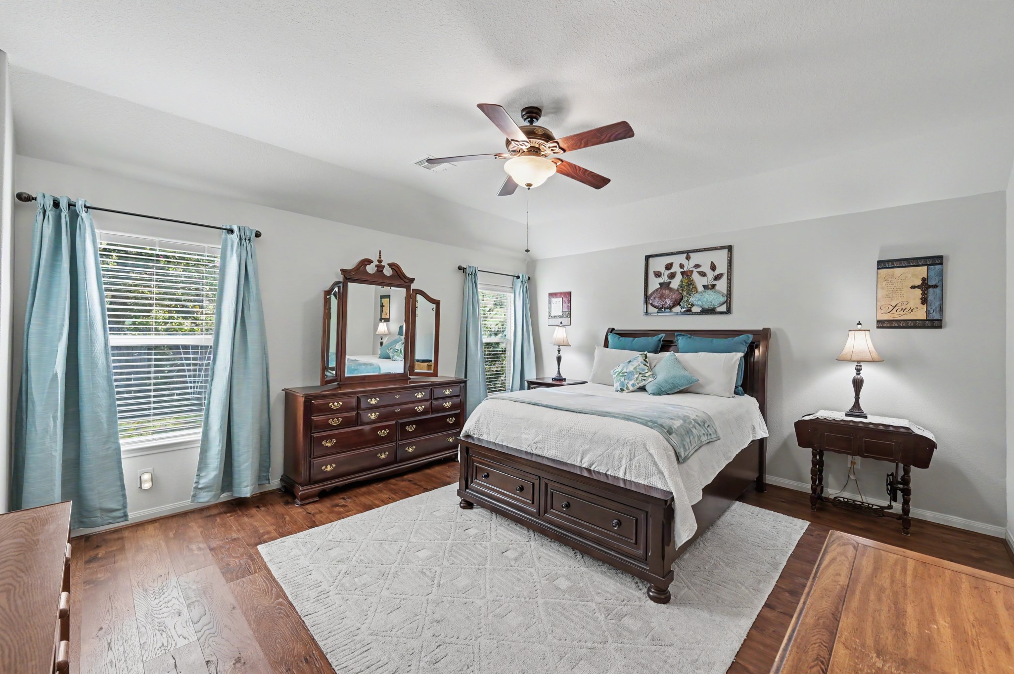 Large primary bedroom (16'x14') overlooks the backyard.