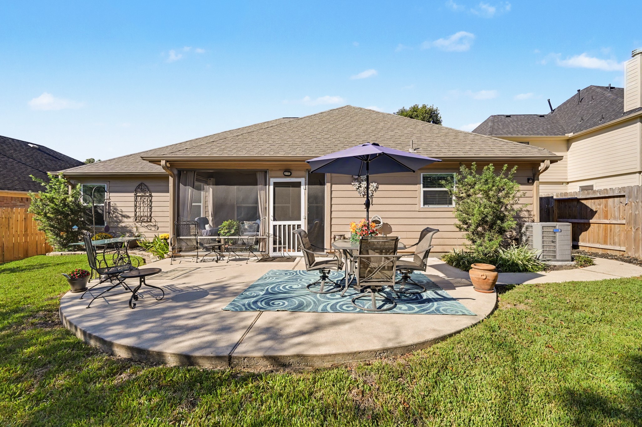 Plenty of outdoor patio for dining, relaxation or possibly adding an outdoor kitchen.