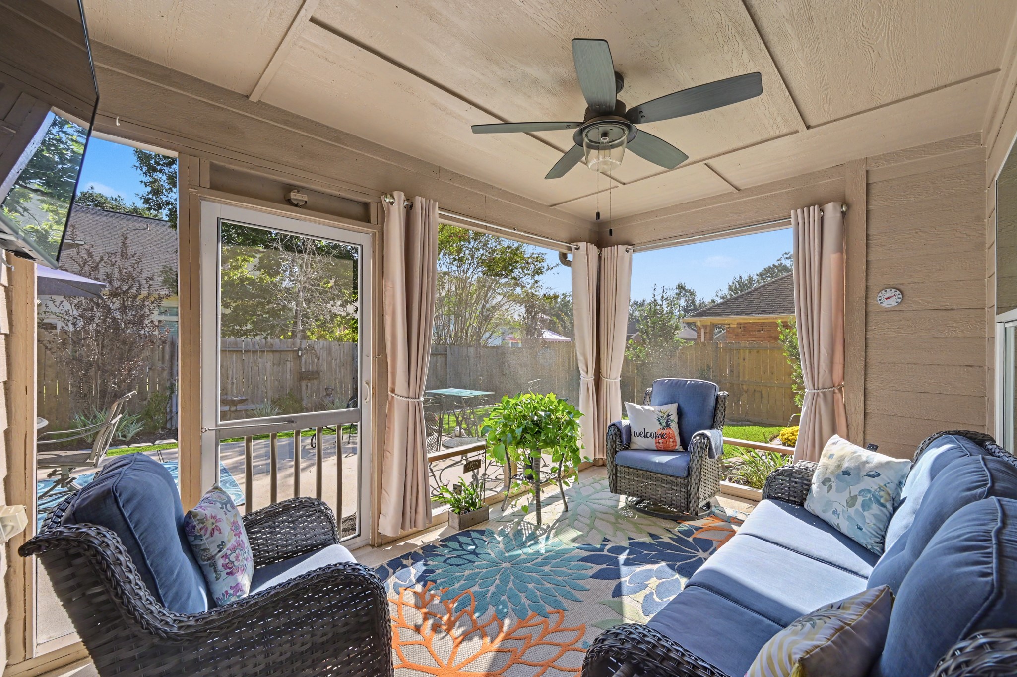 Screened in porch.  Enjoy the peaceful backyard oasis.