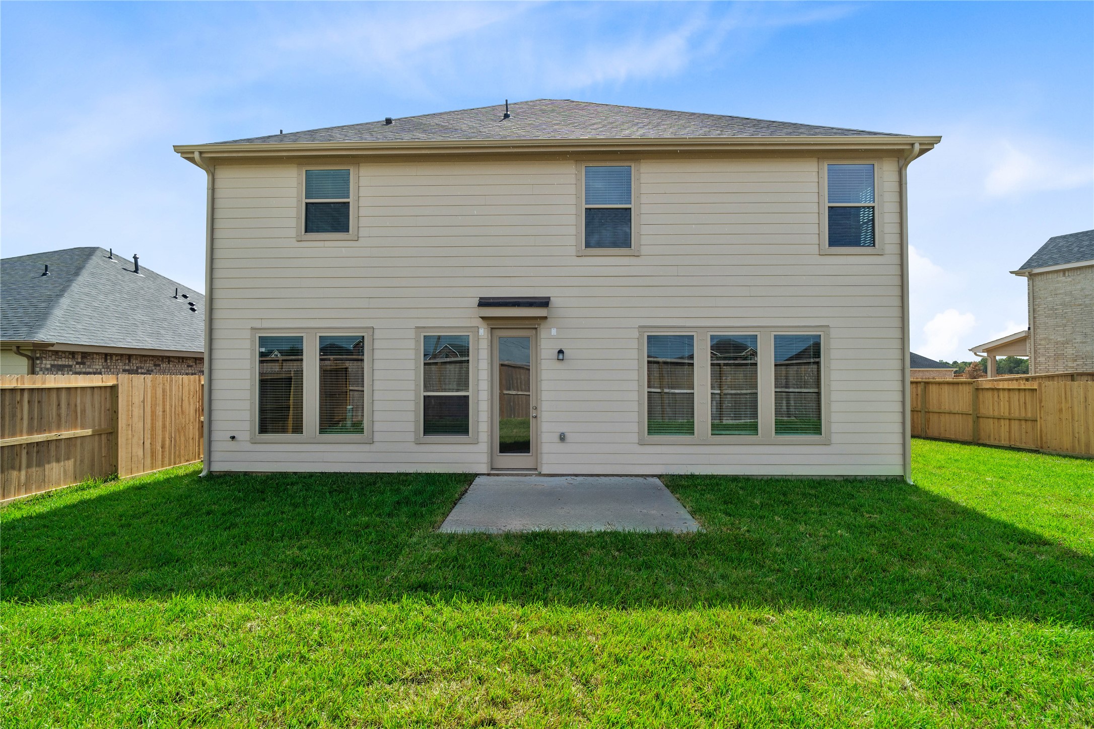 Come and see this spacious backyard. There is plenty of room for the kids to play and adults to relax!