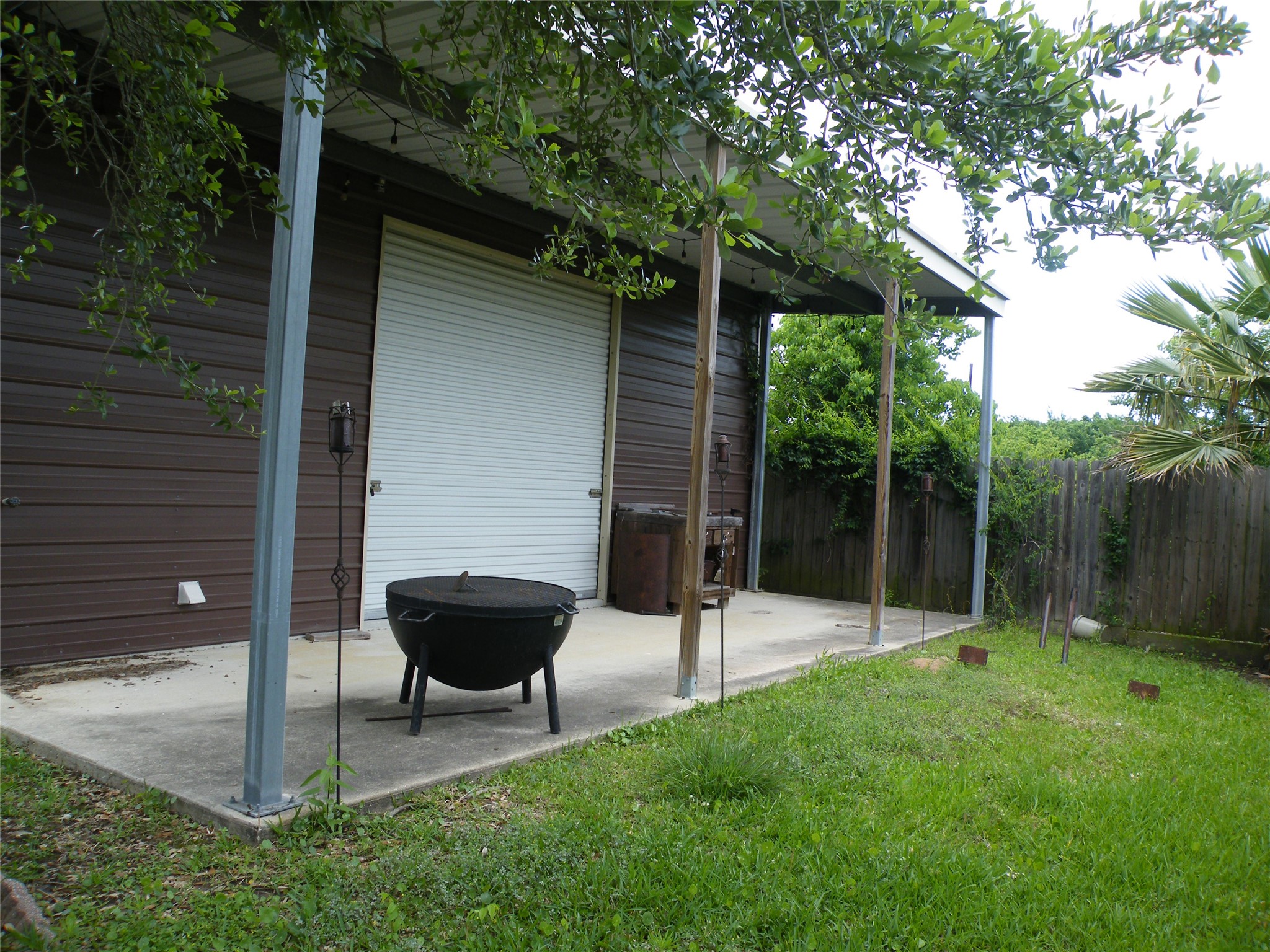 Covered patio for cookouts and enjoyment