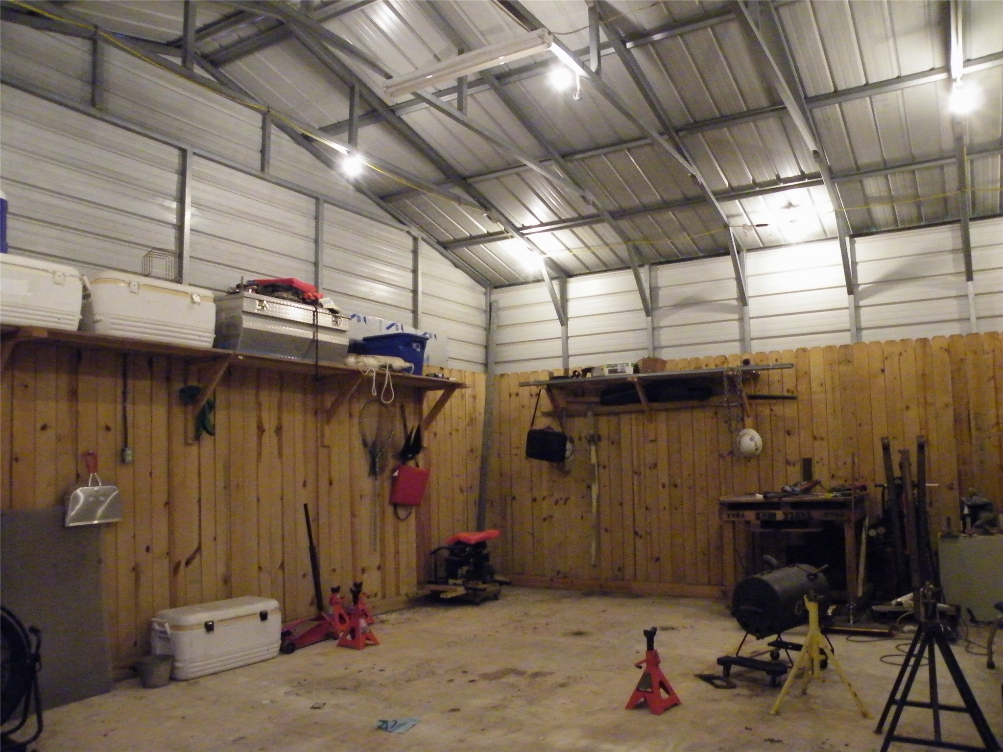 Another view, tall ceilings of this steel workshop