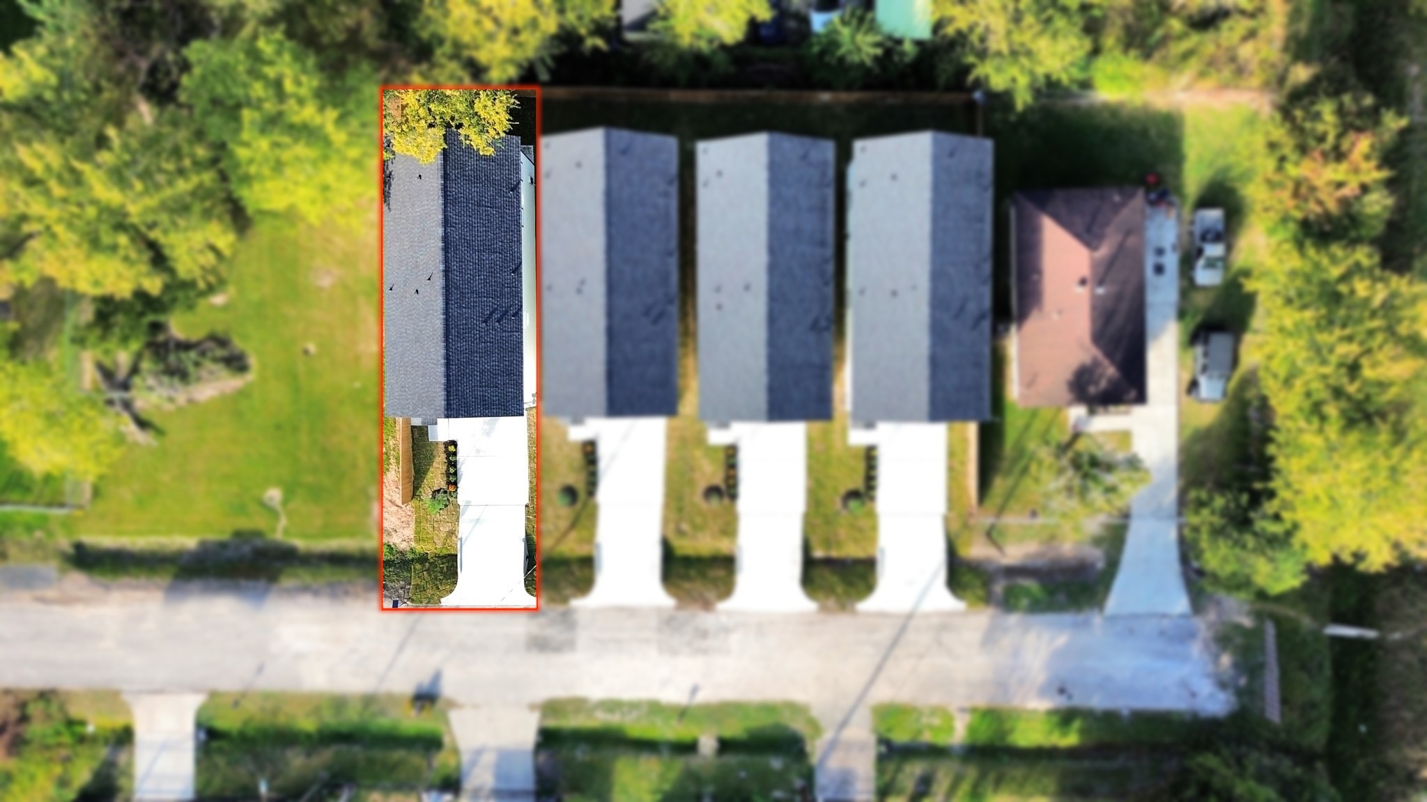 Overhead aerial view showcasing the four newly completed homes at 6671, 6673, 6675 & 6677 Nielan St, highlighting their matching architectural designs, individual driveways & property layouts.