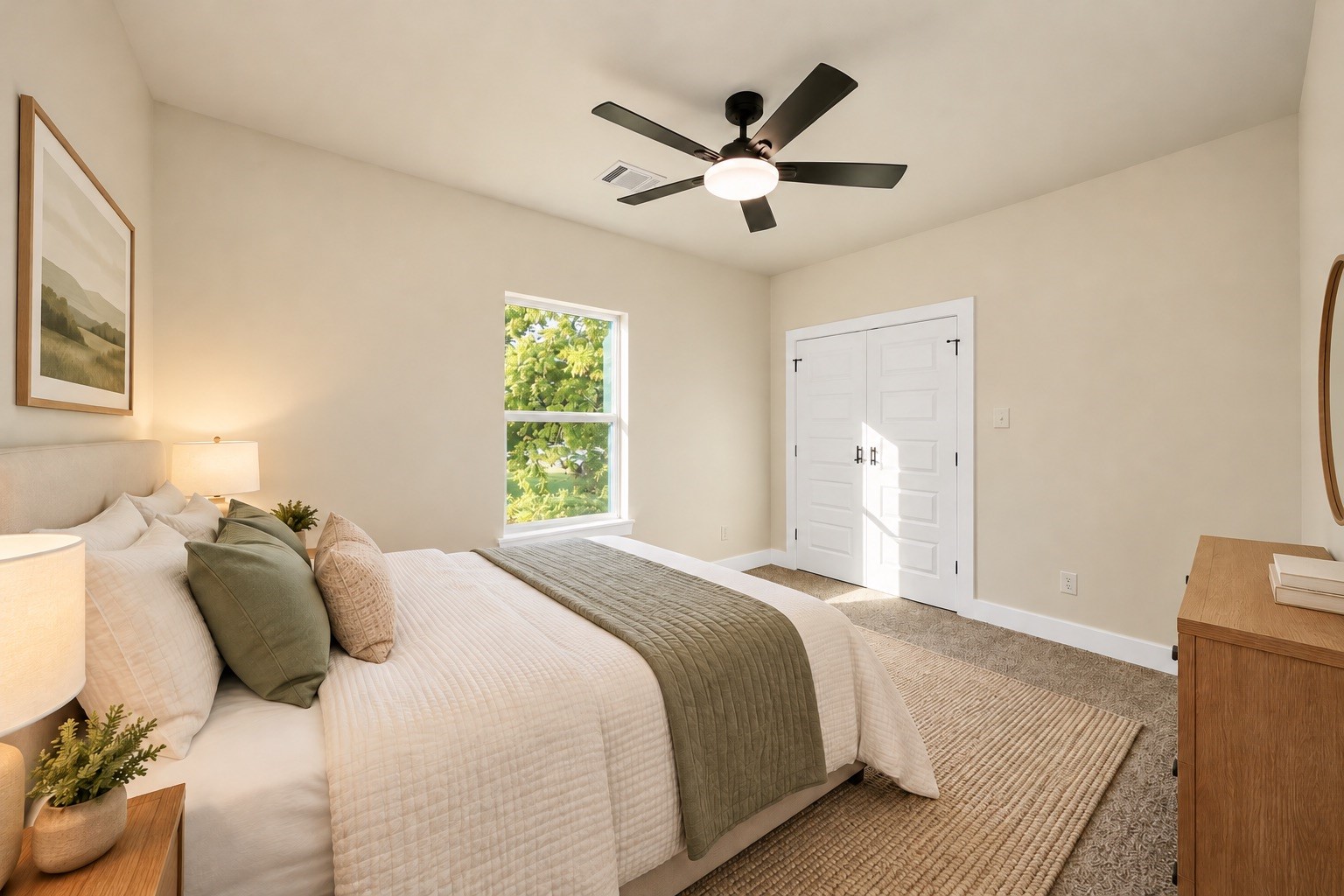 Comfortable upstairs secondary bedroom featuring plush carpeting, ceiling fan, neutral finishes, natural light & closet storage |  Virtually staged