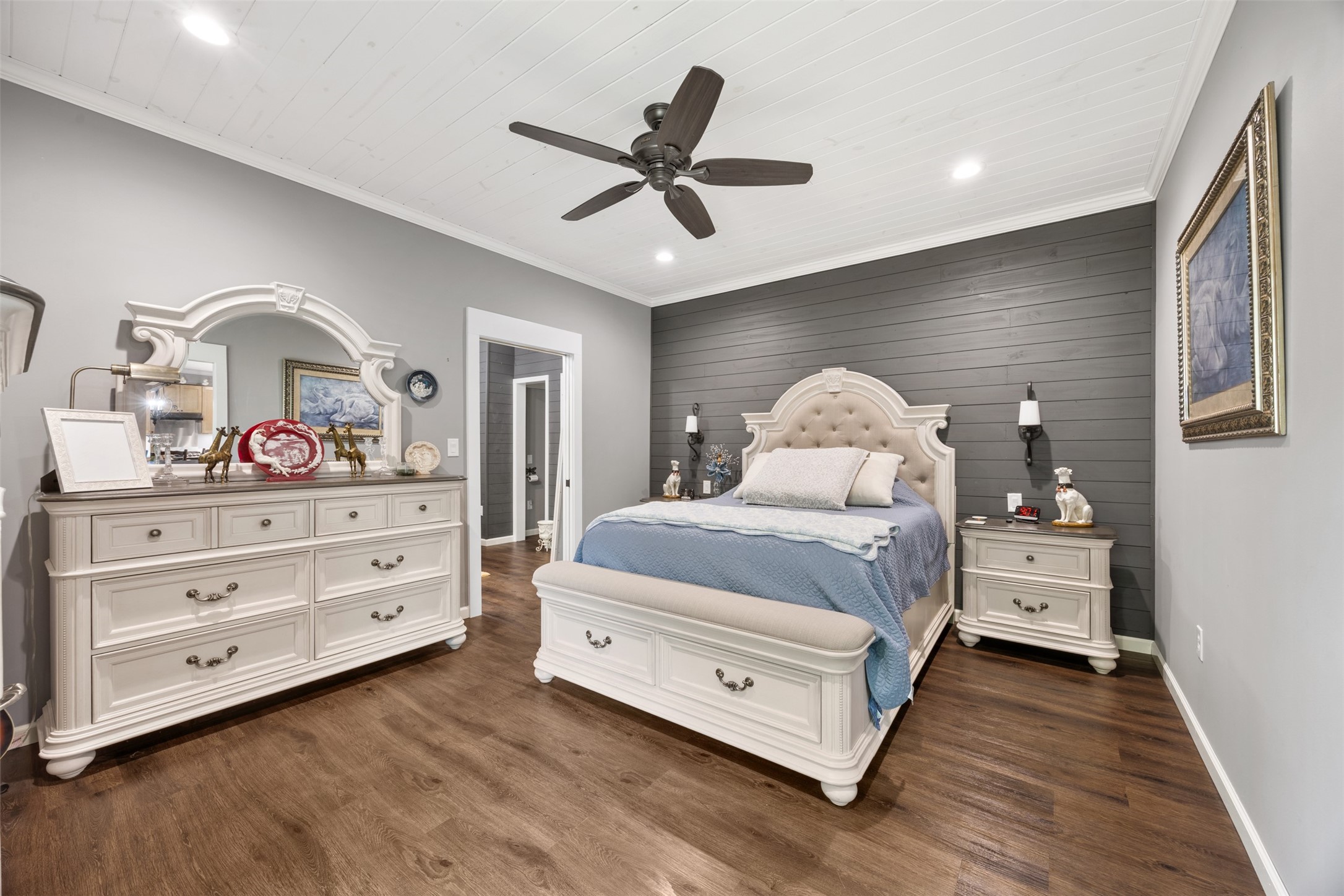 Primary Bedroom...the country feel continues throughout the home.