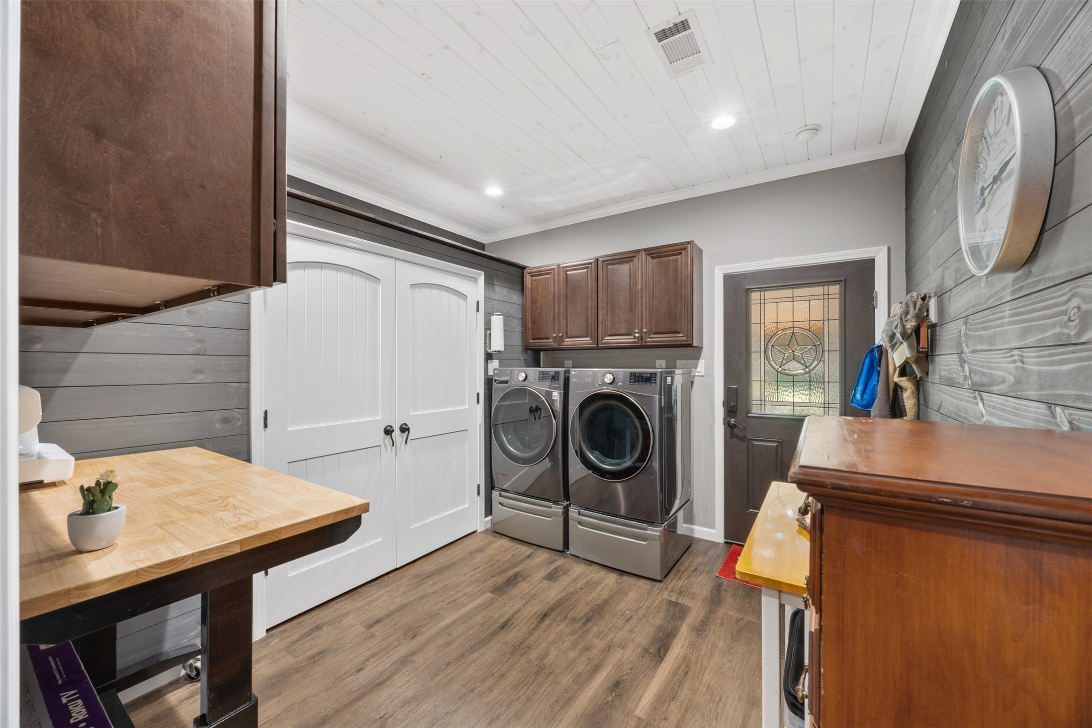 The utility room exits onto the back porch. Huge pantry and extra storage cabinets. The washer and dryer stays with the home