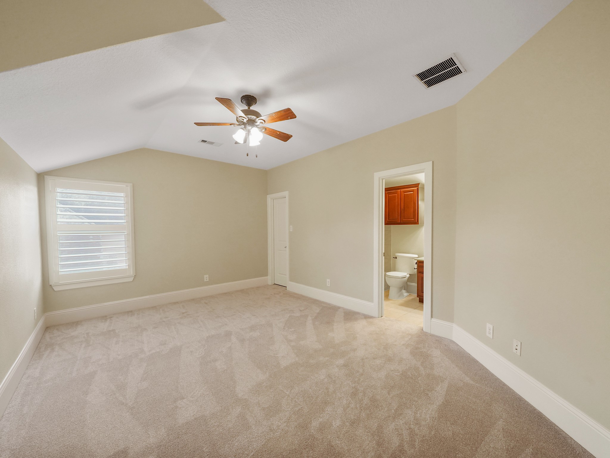 This generously scaled secondary suite brings a sense of separation and comfort for guests or multigenerational living with a private ensuite bathroom.