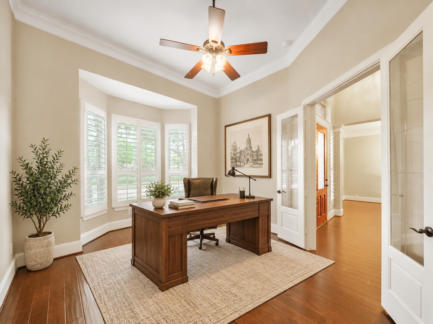 Virtually staged: Framed by natural light and warm finishes, the office shows how effortlessly it can become a refined work-from-home retreat.