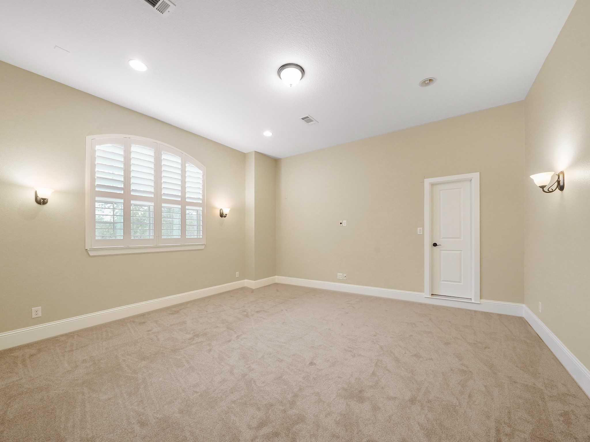Generous scale gives this upstairs bedroom the flexibility to remain a serene sleeping space or become the game room, media lounge, or hobby room your lifestyle calls for.
