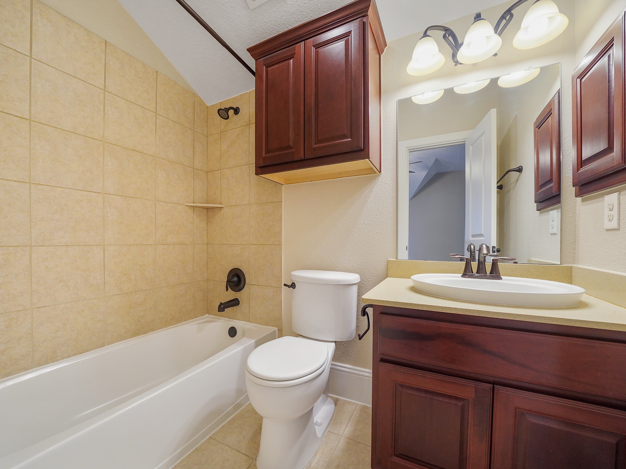 Its adjoining bath completes the suite with a well-appointed space to begin and end the day.